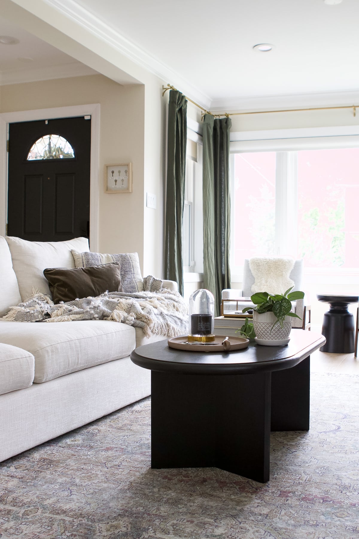 Coffee Table with Matte Black Oval Top and Slab Base