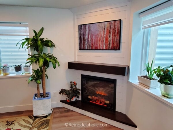 Corner Fireplace Shiplap Surround With Thick Wood Mantel
