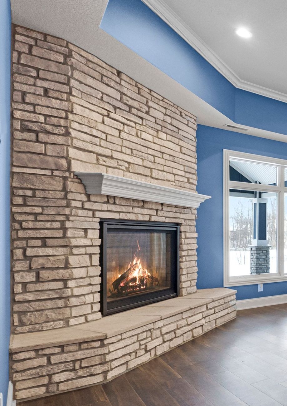 Corner Fireplace Stone Surround and Extended Stone Hearth