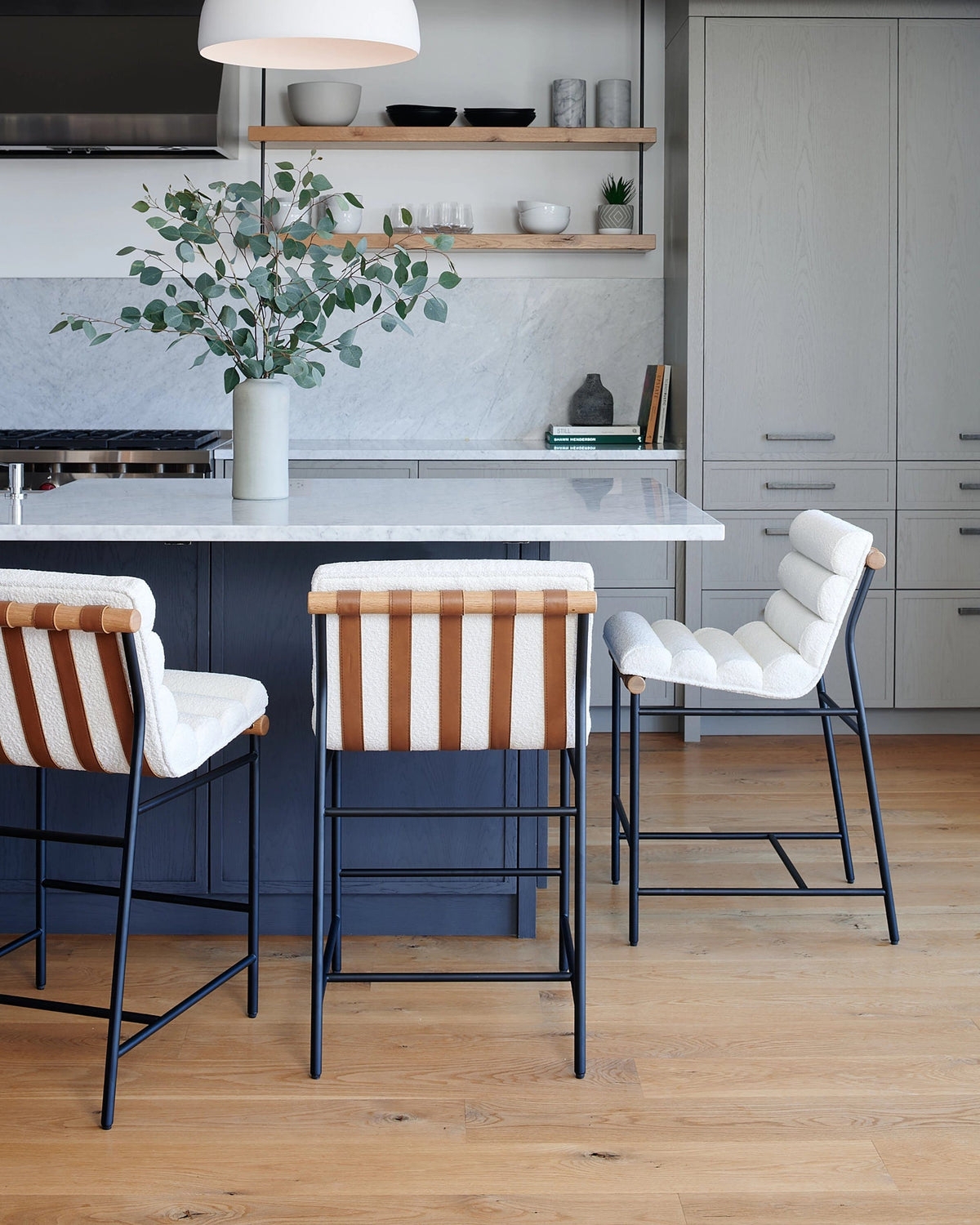 Counter Stool with Tan Back Straps and Boucle Upholstery