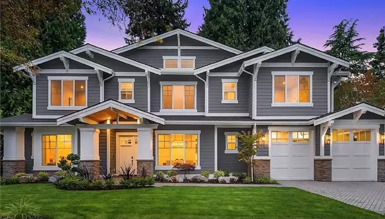 Craftsman House with Stone Piers and Charcoal Gray Siding Style