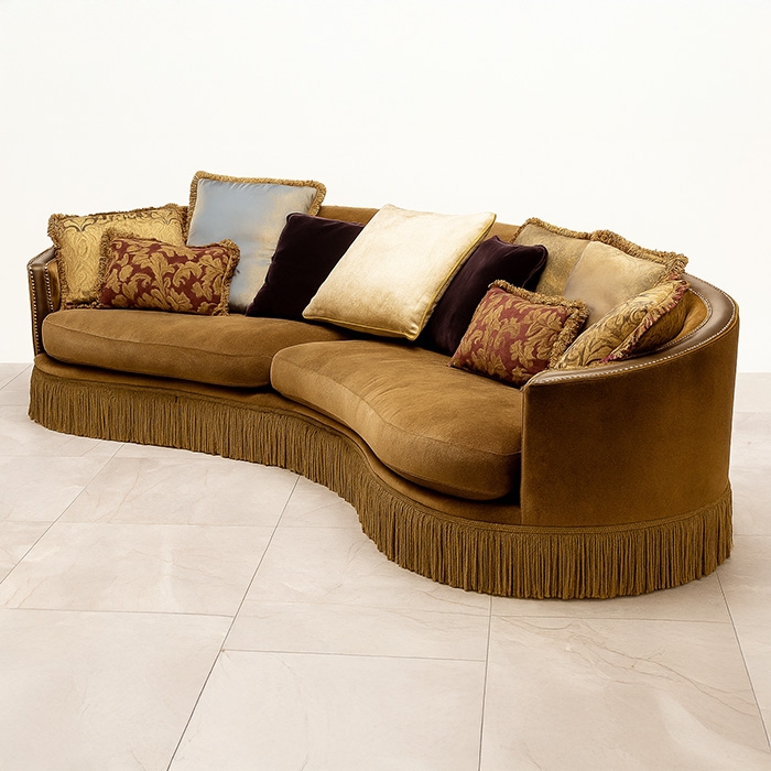 Curved Sectional in Ochre Gold with curved fringe sectional sofa