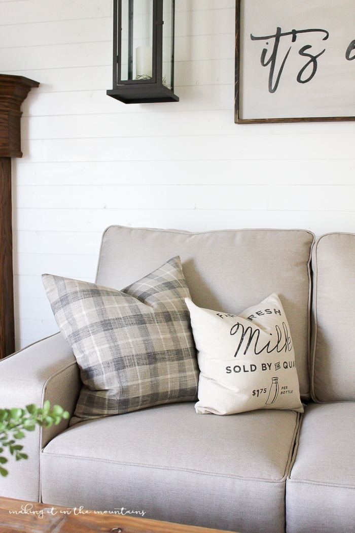Custom Sofa with Shiplap Background and Neutral Living Room Shiplap