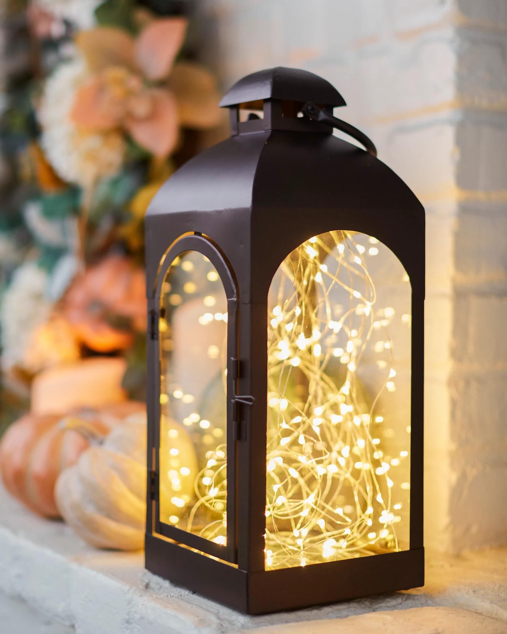 Decorative Lantern: Arched Glass Panels for Autumn Mantel Lighting