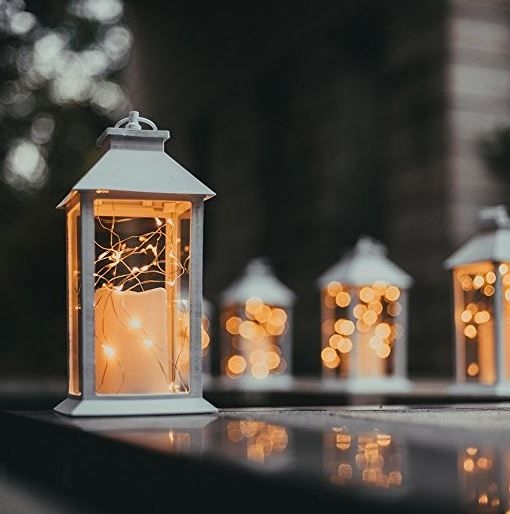Decorative Lantern: Matte White Pillar Candle and Fairy Light Glow