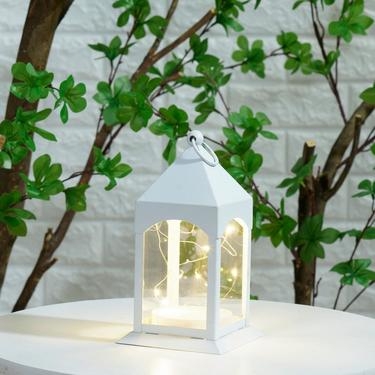 Decorative Lantern: White Metal Frame and Arched Windows Accent