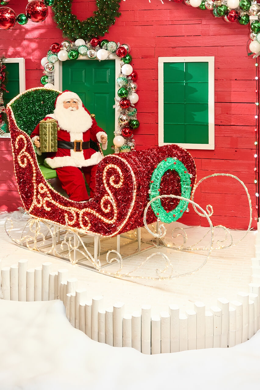 Decorative Sleigh with Lighted Runners and Tinsel Texture