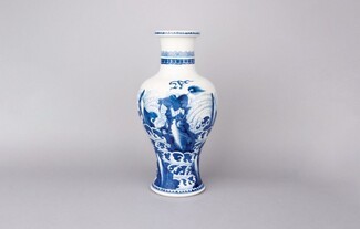 Decorative Vase Featuring Wave Motif and a Flared Base