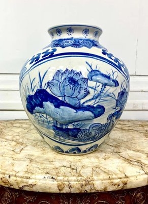 Decorative Vase with Lotus Flower Motif and Bulbous Body