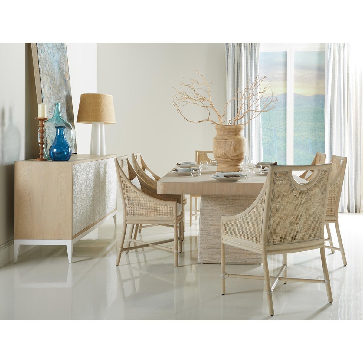 Dining Chair featuring Woven Cane Back and Curved Silhouette