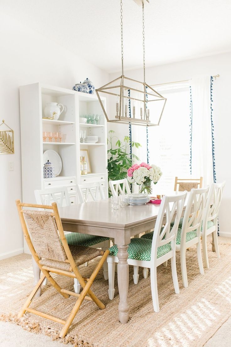 Dining Room Set with X Back Design and Green Patterned Cushions