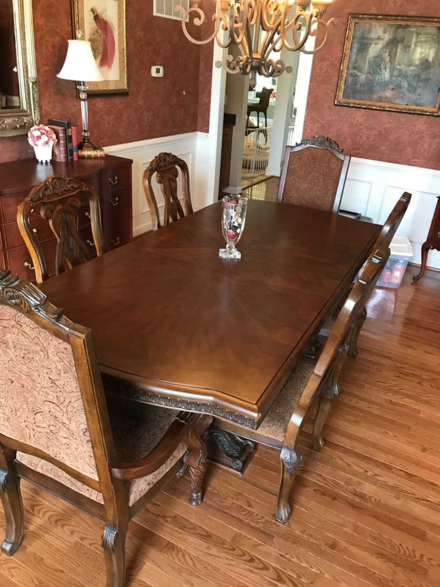 Dining Set Featuring Sunburst Veneer Table and Damask Seats