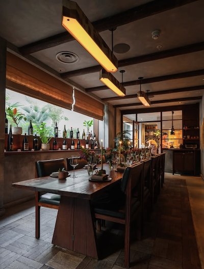 Dining Set Linear Pendant Lighting With Exposed Beams