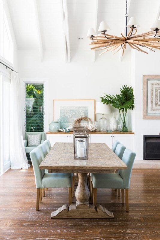 Dining Set with Aqua Upholstery and Branch Chandelier Decor
