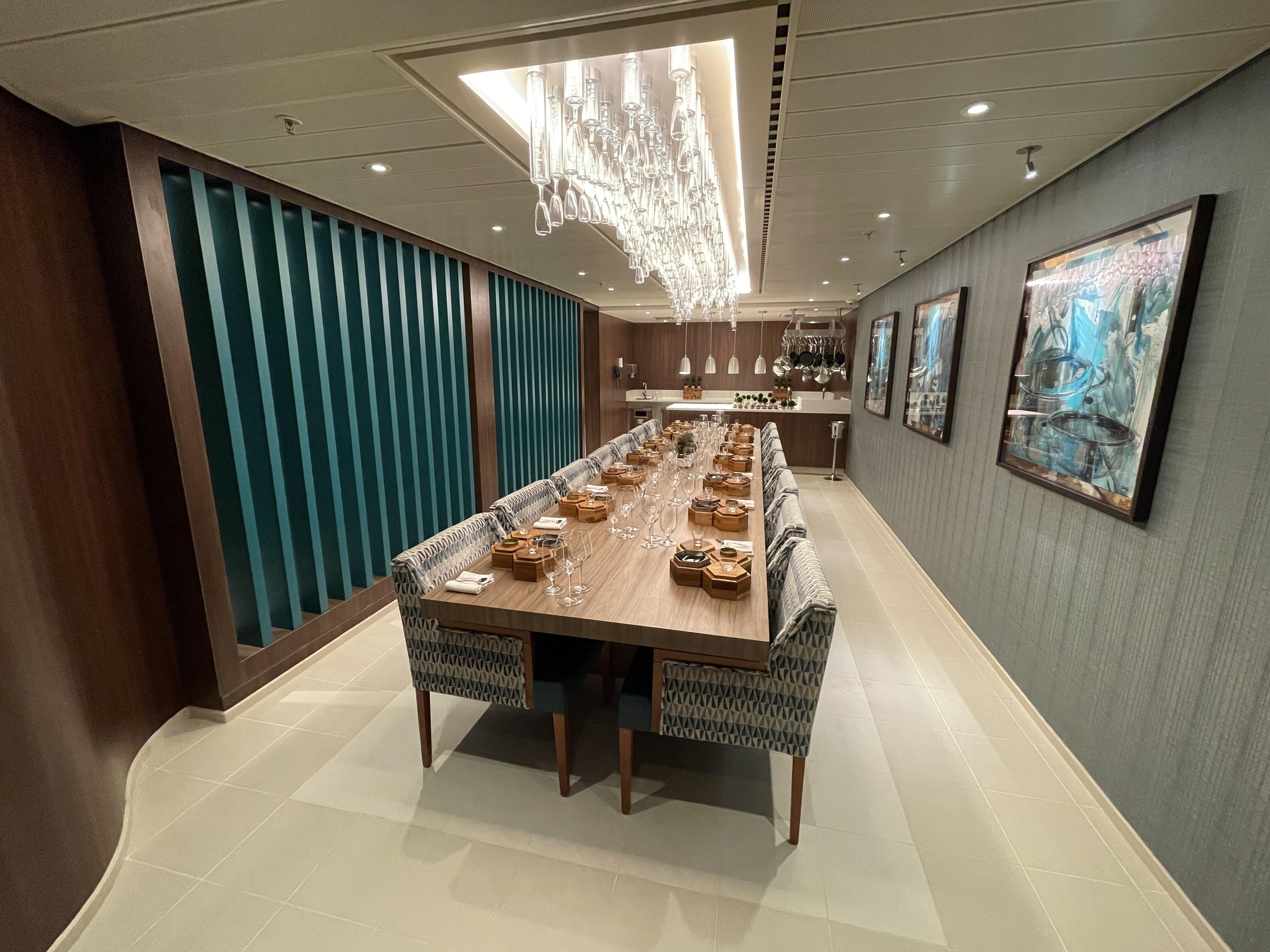 Dining Table Teal Slat Partition With Glass Bottle Chandelier