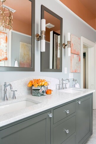 Double Vanity featuring Arched Backsplash and Grey Cabinetry