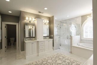 Double Vanity: White Inset Cabinet and Marble Shower