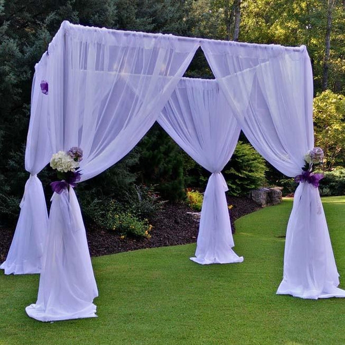 Event Canopy with Floral Corner Accents and Sheer Drapes