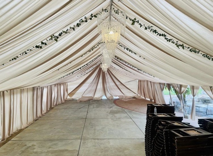 Event Tent with Pleated Fabric Ceiling and Ivy Garlands