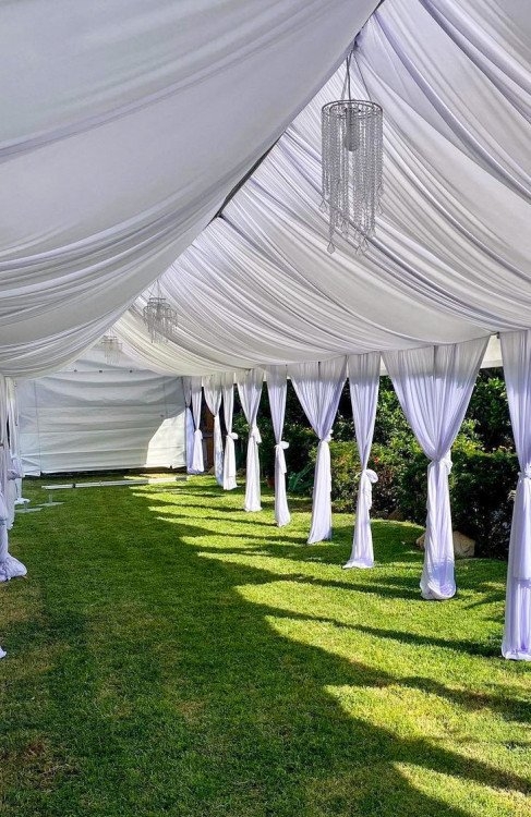 Event Tent with Swagged Ceiling and Tiered Chandeliers