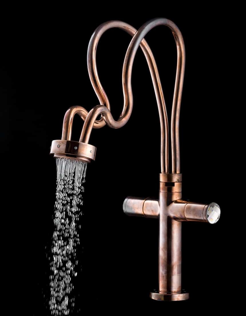 Faucet: Sculptural Copper with Sinuous Piping Design.