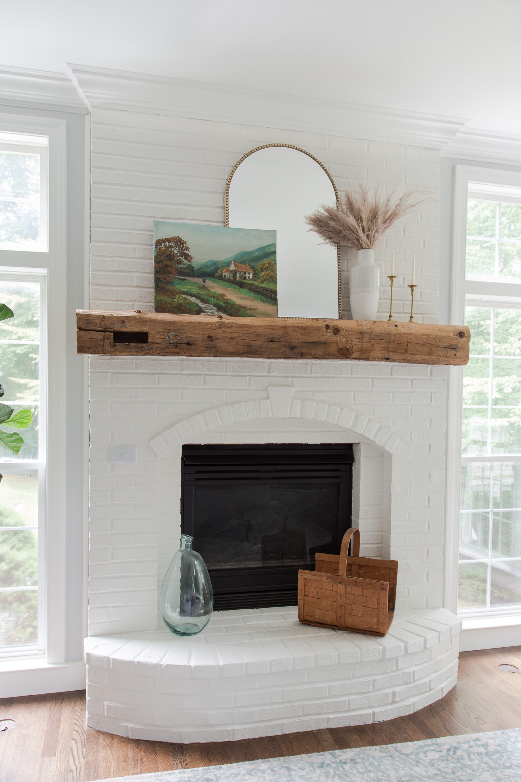 Fireplace Mantel Decor Ideas With Arched Mirror Layering