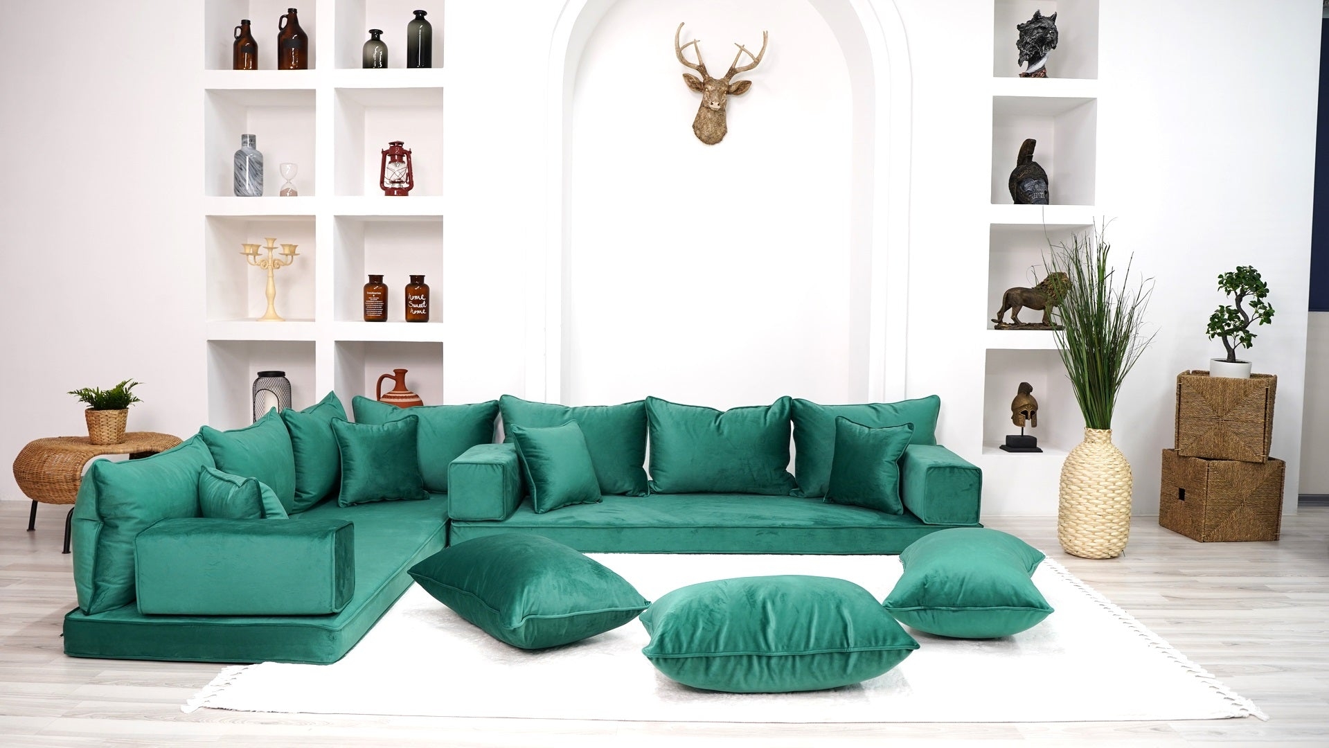 Floor Sofa in Velvet with Built-In Shelving Backdrop