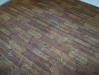 Flooring with Faux Nail Heads and Printed Plank Flooring