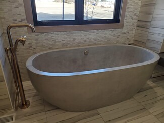 Freestanding Bathtub showcasing Brushed Bronze, Luxury Oval Soaking