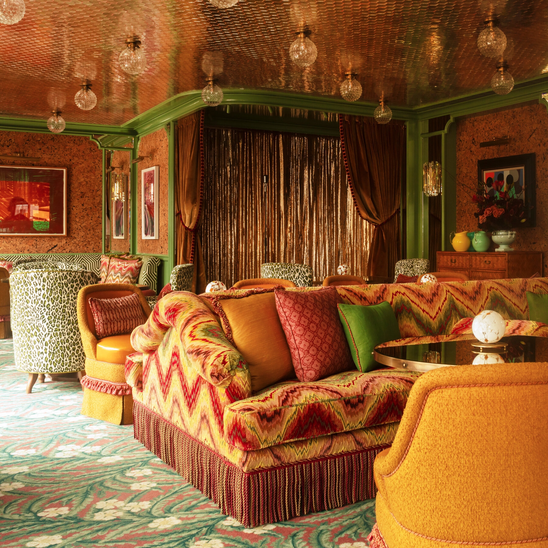 Fringe Sofa with Chevron Upholstery and maximalist fringe sofa