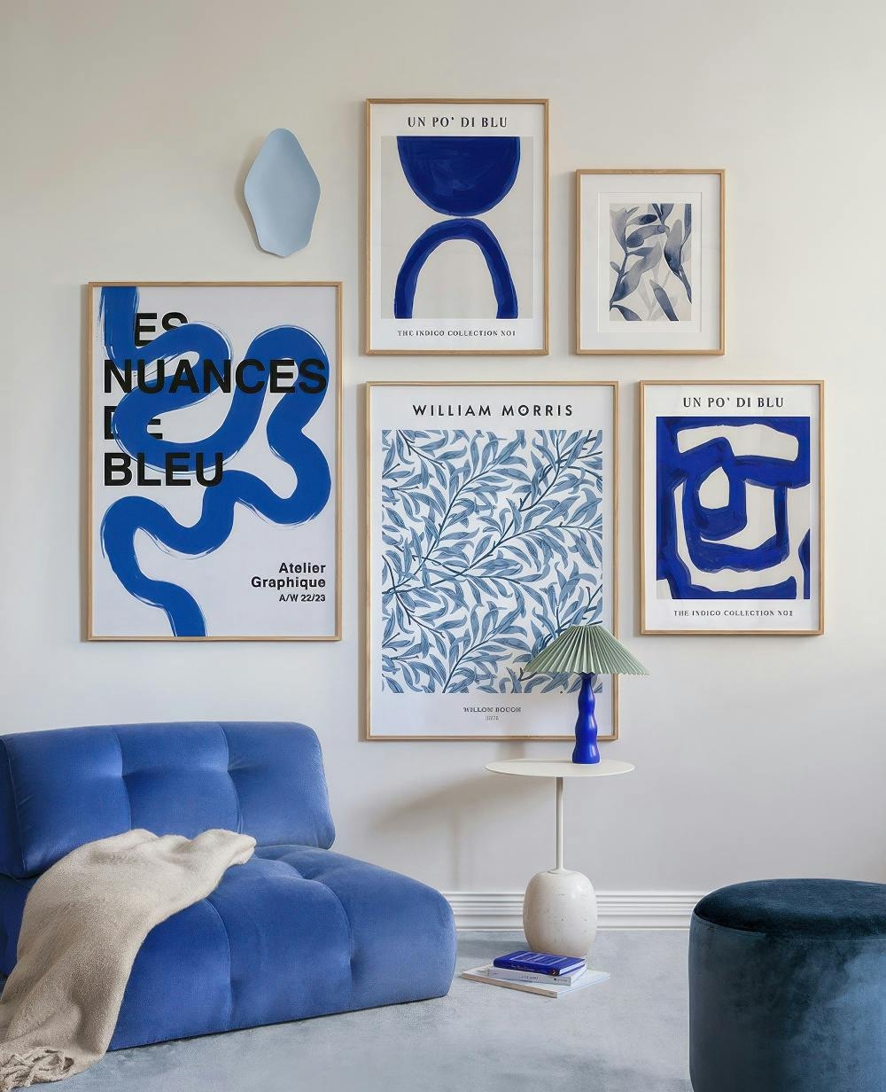 Gallery Wall with Monochromatic Palette and Indigo Botanical Decor