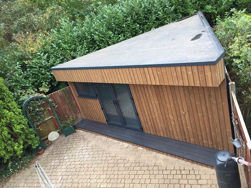 Garden Room: Hidden Storage and Anthracite Garden Doors Design
