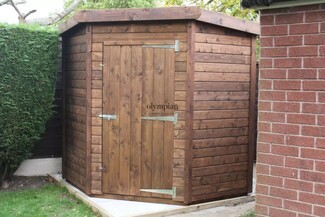 Garden Shed: Corner Footprint Walnut Stained Garden Building