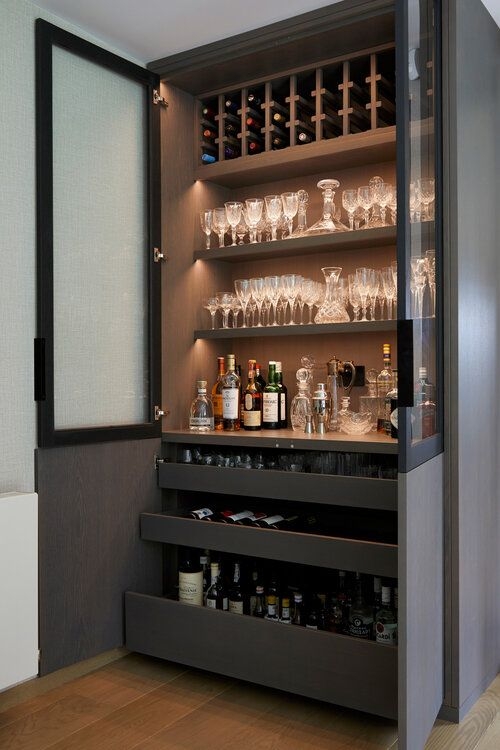 Home Bar Cabinet featuring Integrated Lighting and Shelves