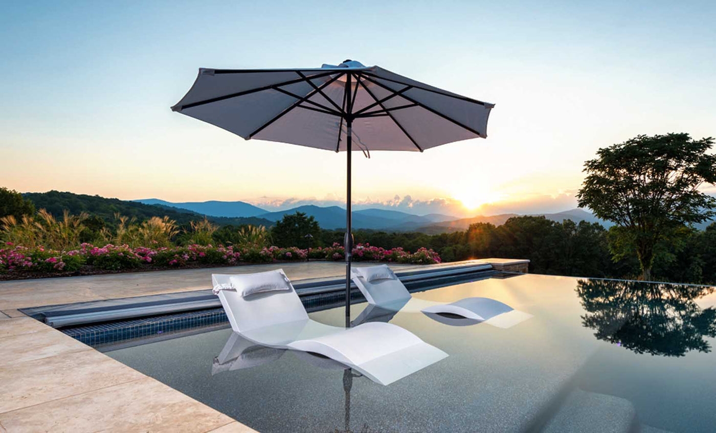 In Pool Lounger: Contoured White Resin Sun Loungers
