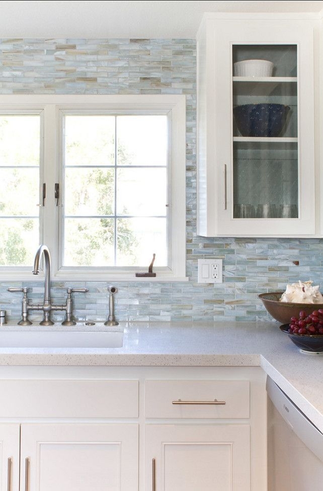 Kitchen Backsplash Iridescent Linear Tiles and Bridge Faucet