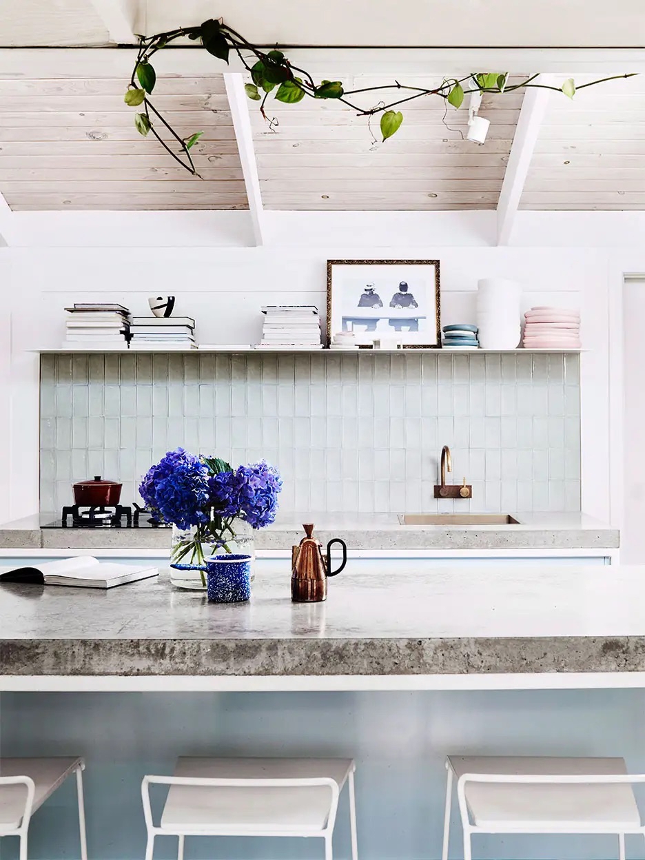 Kitchen Island Concrete Slab and Vertical Stack Subway Tiles