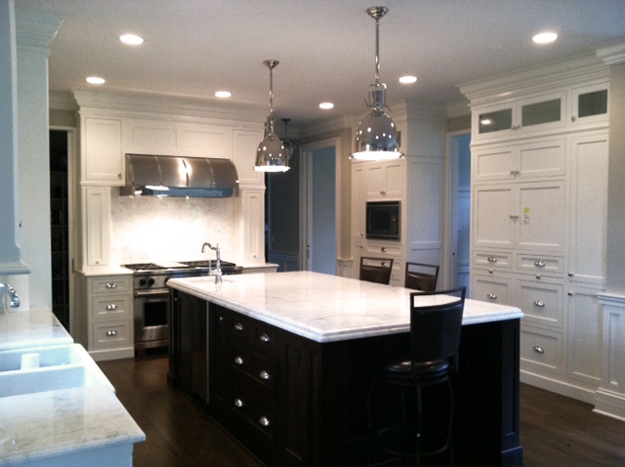 Kitchen Island Contrast with White Shaker Cabinets and Marble