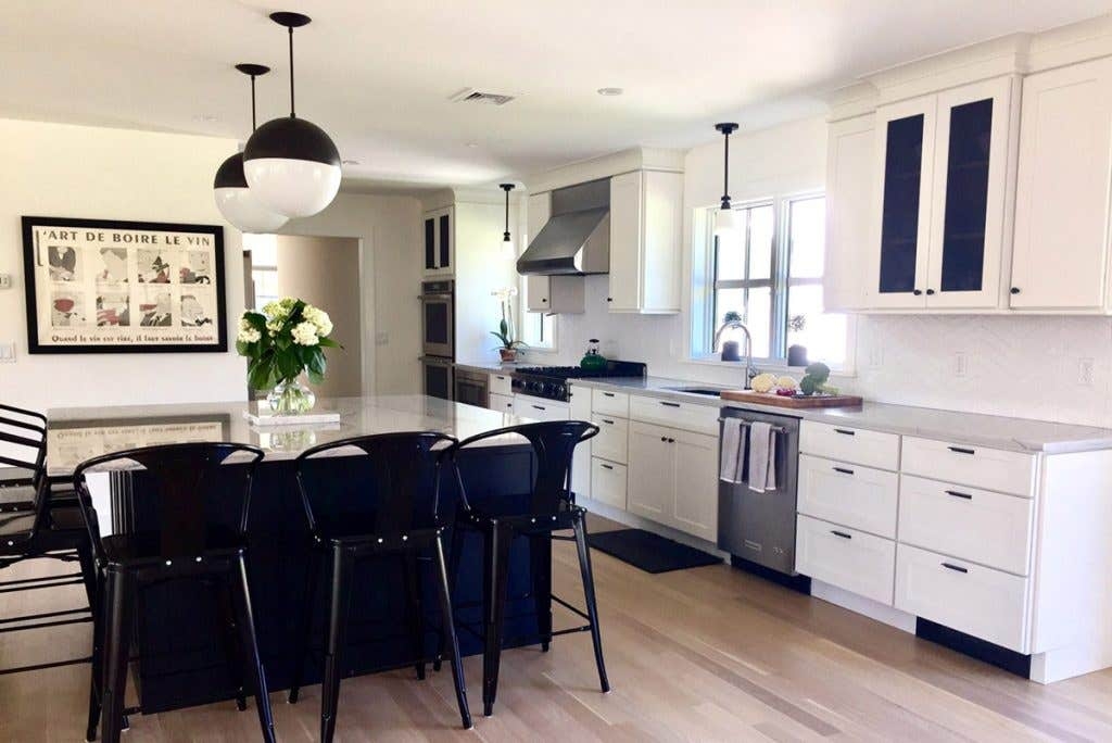 Kitchen Island with Tolix Style Stools and Split Tone Lighting