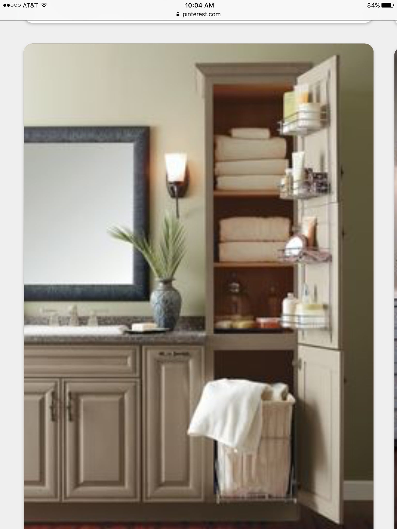 Linen Tower with Pull Out Hamper and Door Mounted Racks in Taupe