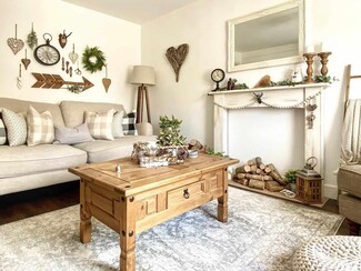 Living Room Set Using Stacked Log Display Cozy Farmhouse Room