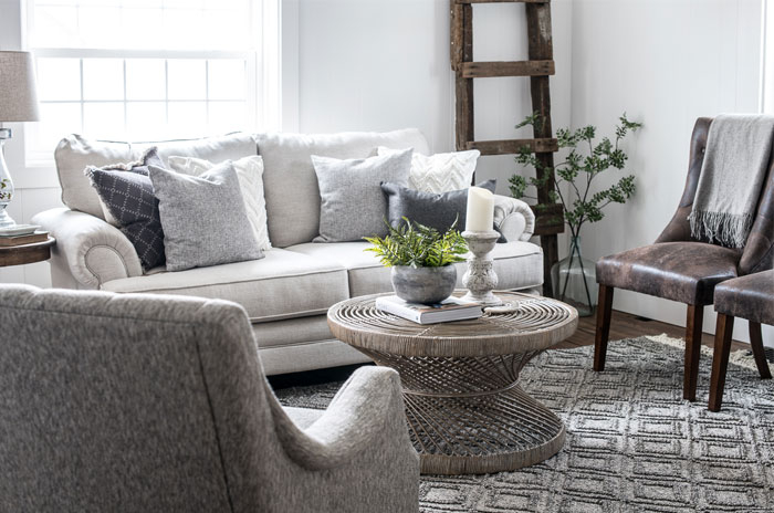 Living Room Set with Hourglass Woven Table and Trellis Pattern Rug