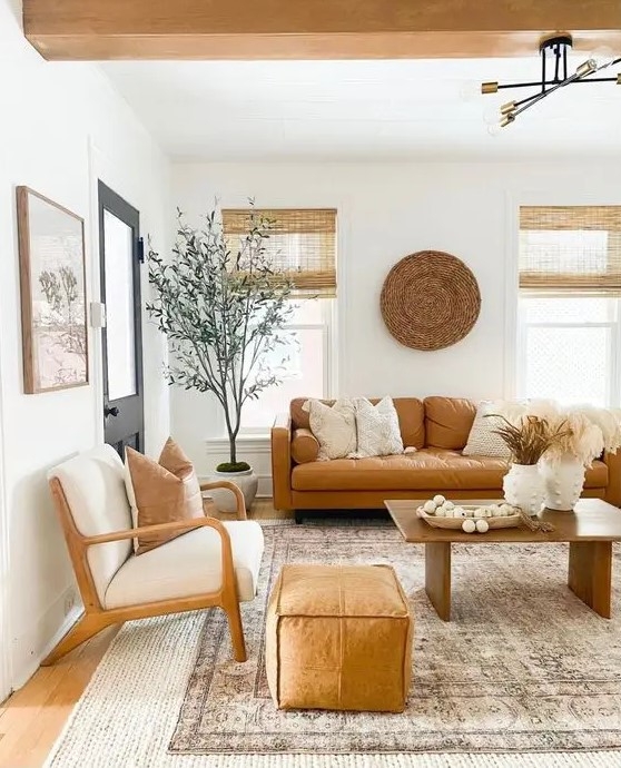 Living Room with Amber Leather Sofa and Woven Wall Decor