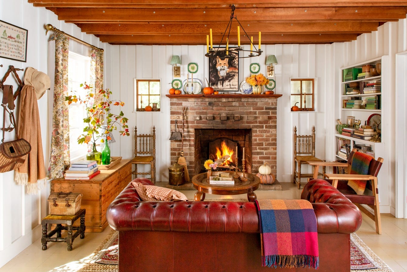 Living Room with Exposed Ceiling Beams and Red Chesterfield Sofa Styling
