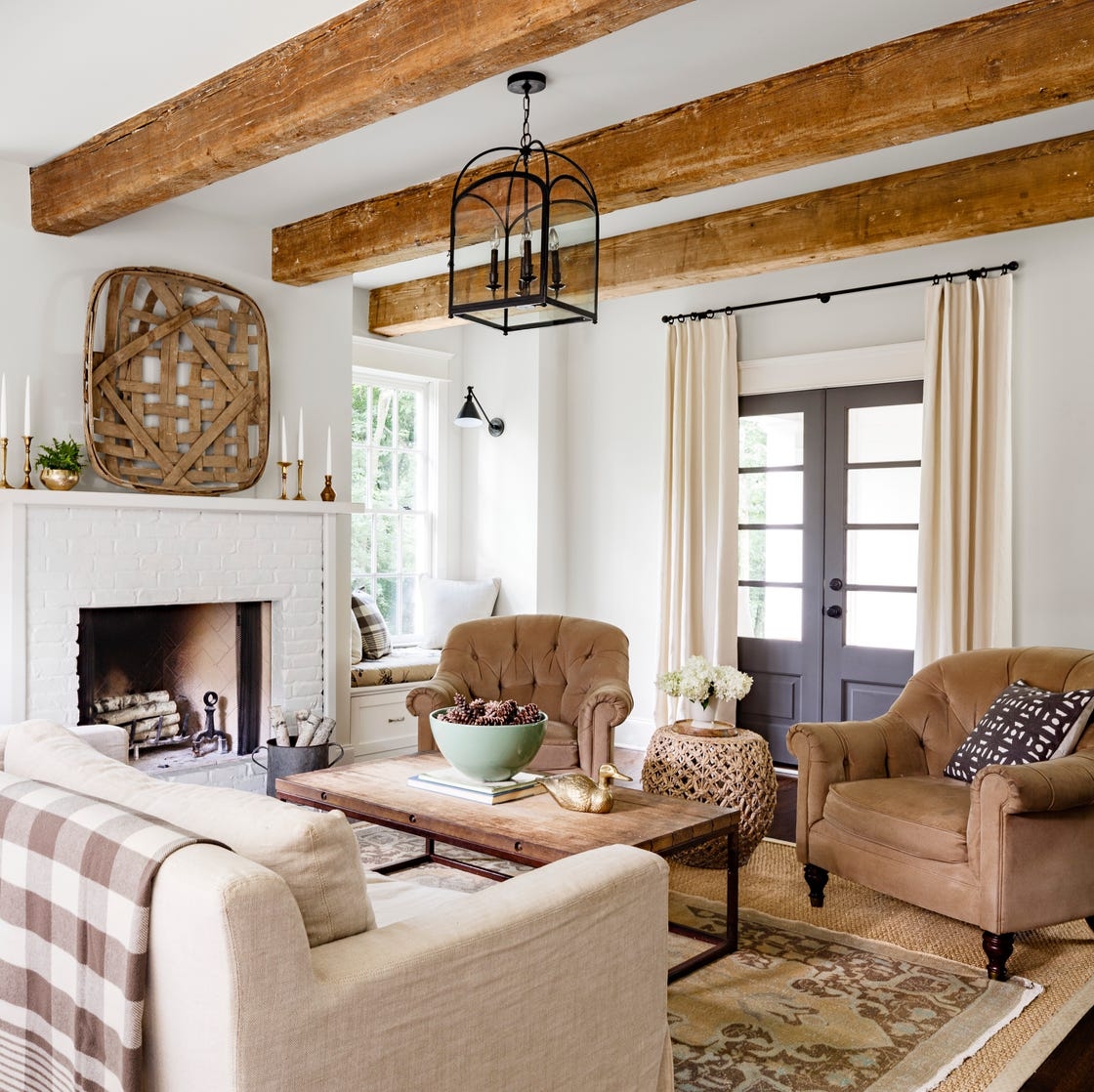 Living Room With Exposed Timber Beams And Rustic Decor