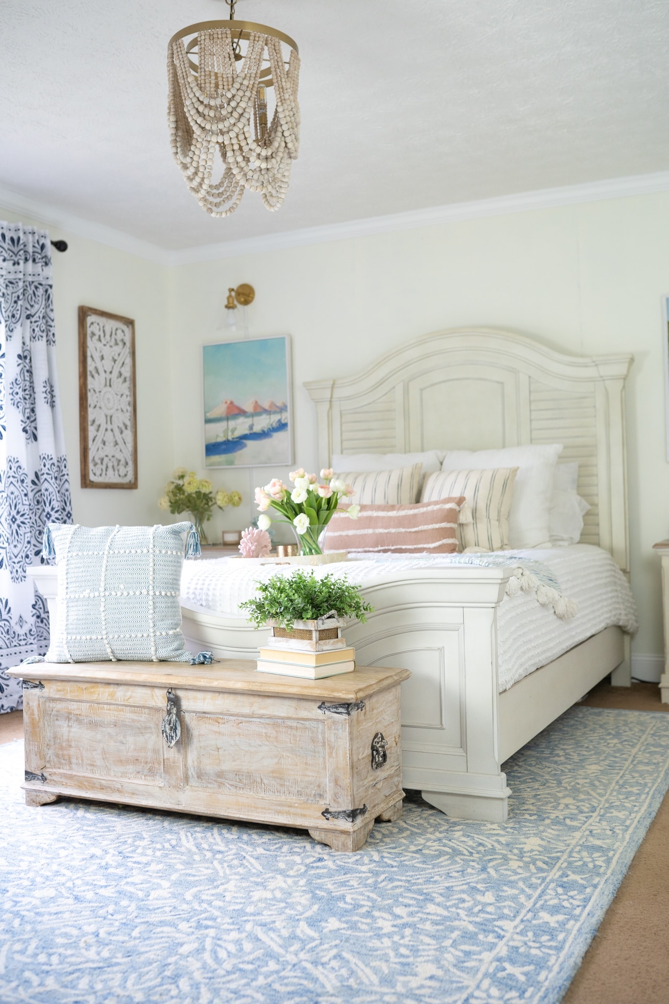 Master Bedroom with Wood Bead Chandelier: Storage Trunk Ideas