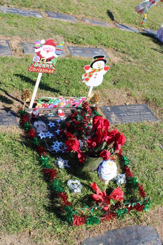 Memorial Decor with Holiday Gravesite Decorations and Tinsel Perimeter
