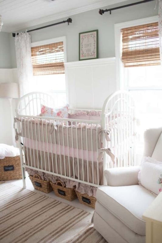Metal Crib with Wicker Storage Bins and Arched Metal Frame