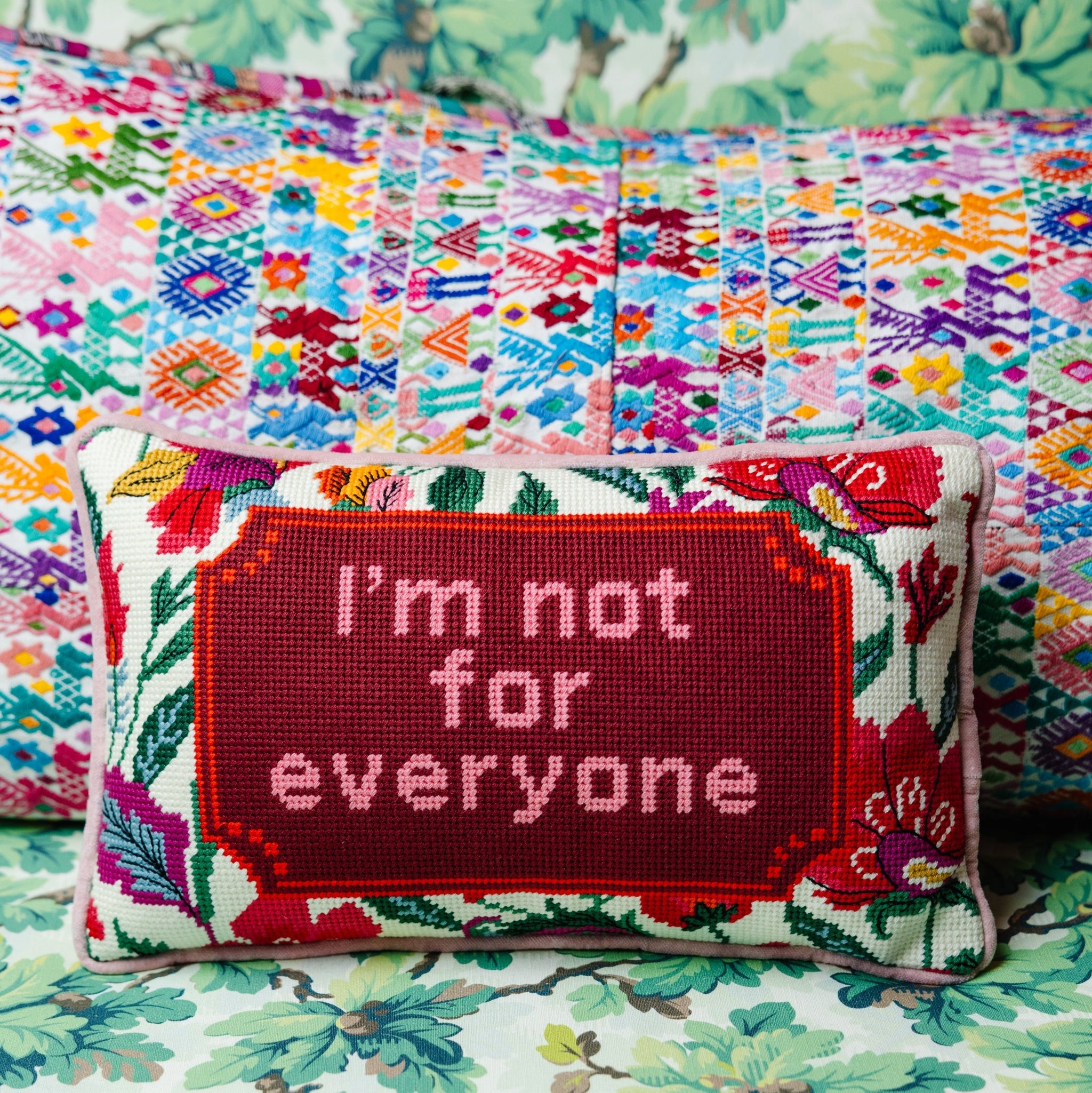 Needlepoint Pillow with Cheeky Typography and Burgundy Red Base