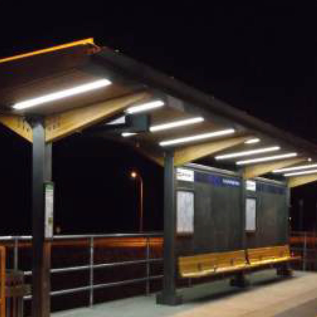 Outdoor Lighting with Linear Solar Fixtures and Metal Shelter